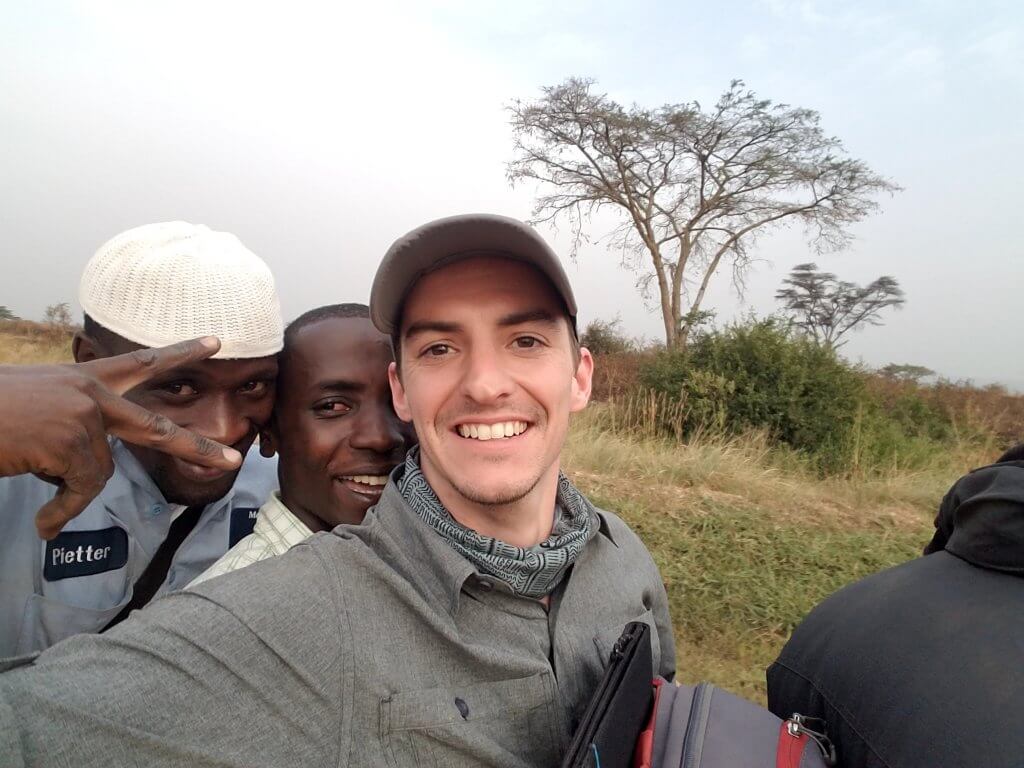 Riding on a motorbike with three strangers in uganda