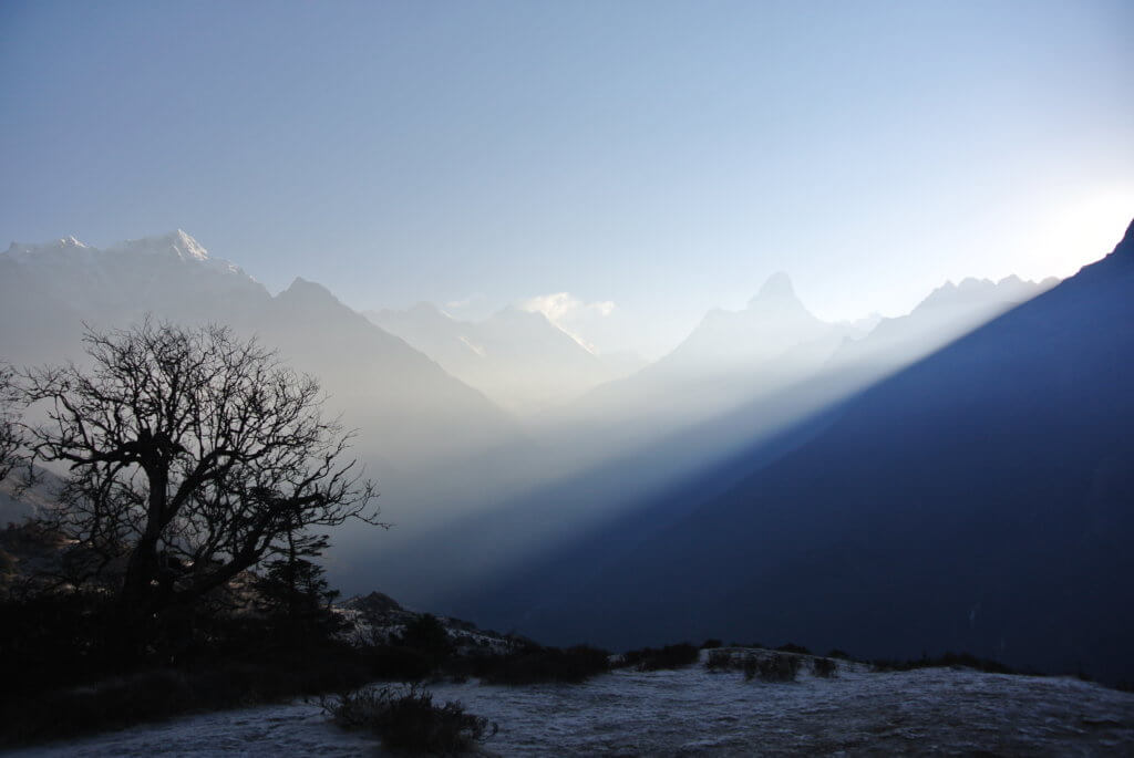 First views of Everest on the trek.  Early morning light breaks over the ridges.