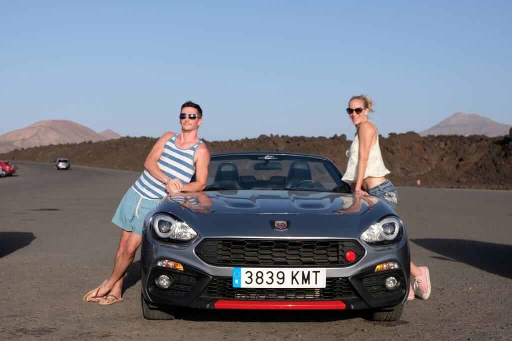 Andrew and Lara on Lanzarote with their Fiat Spyder Abarth rental car